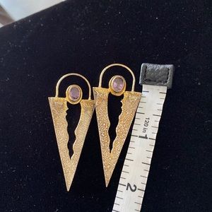 Artistic Michu earrings with Sterling liver goo leaf and amethyst stone.